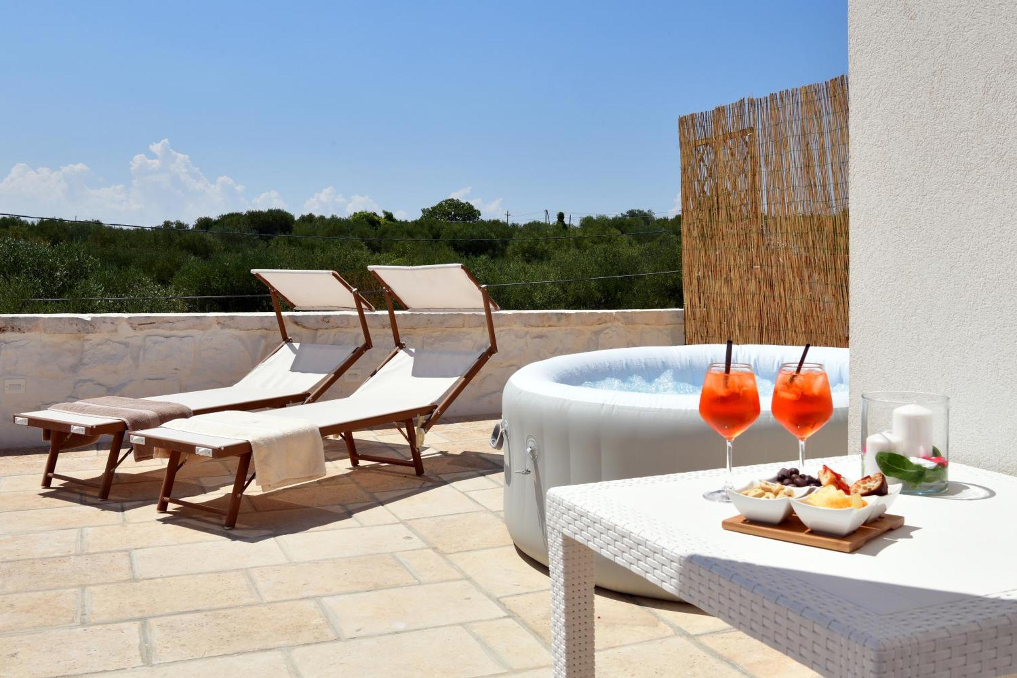 Lamarossa Trulli & Suites Antonelli Extérieur photo